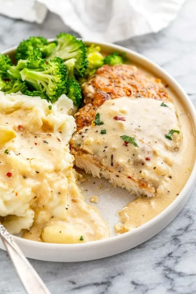 Creamy garlic chicken breasts with herbs and spices