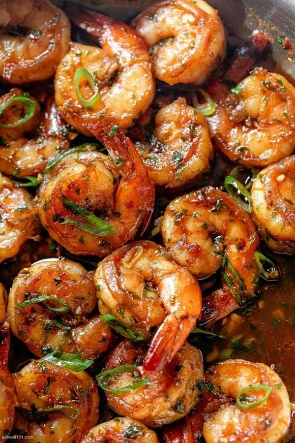 Delicious Honey Garlic Shrimp served on a plate with fresh garnishes