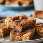 Delicious easy cinnamon sugar blondies topped with a sprinkle of cinnamon sugar