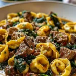 Savory garlic butter beef tortellini with spinach in a creamy sauce