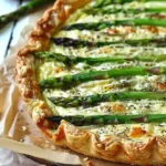 Delicious Asparagus Gruyere Tart with flaky pastry and fresh asparagus